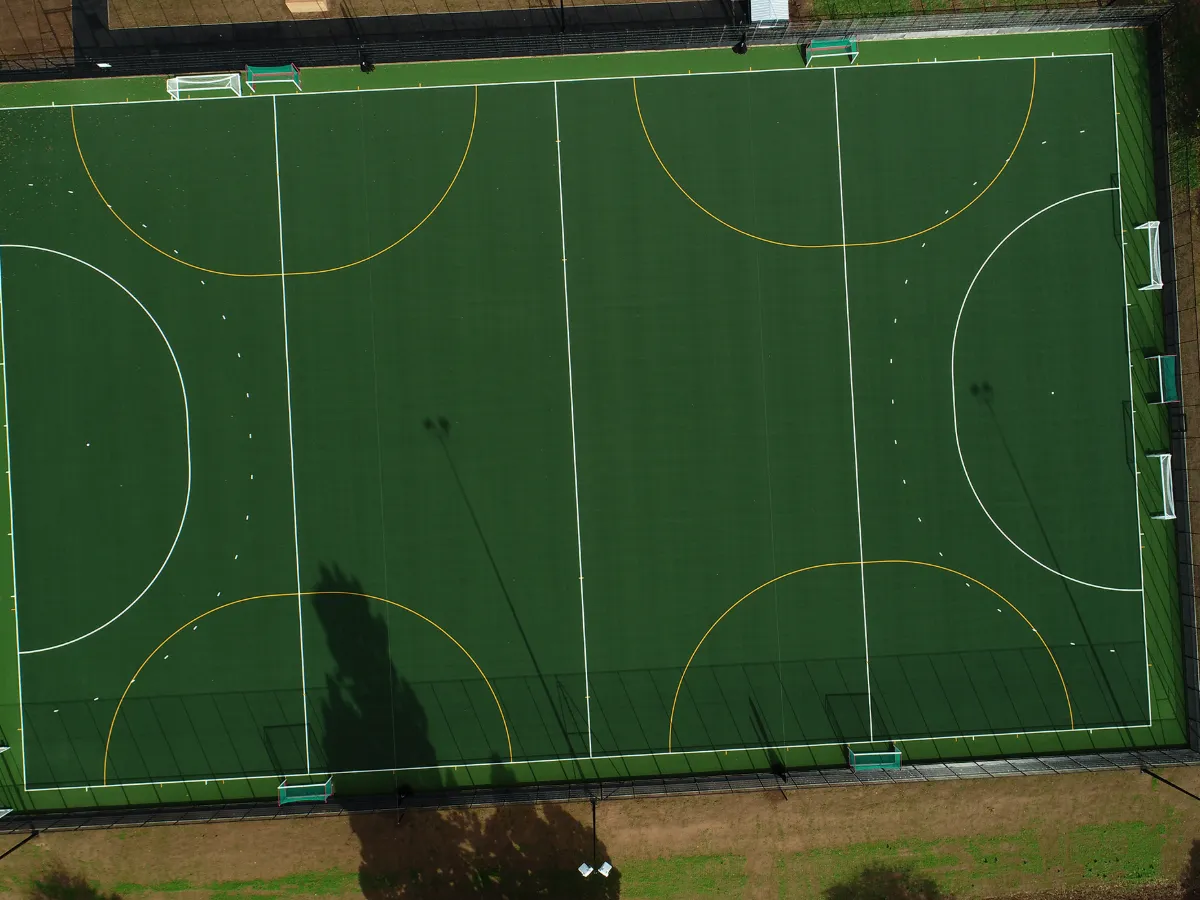 Full-size sand dressed synthetic hockey pitch at Winterfold House School